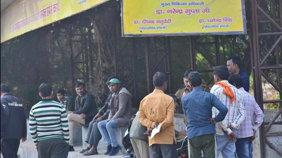 People gather at Nurpur village in Muradnagar after an 18-year-old man was killed in a knife attack at his home on Thursday night. (Sakib Ali/HT Photo)