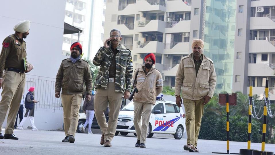 Police officials at the multi-storeyed residential complex of Centra Greens society in Ludhiana on Friday. (Gurpreet Singh/HT)
