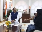 CM Shivraj meets Samina who was allegedly beaten up by her brother-in-law.
