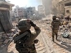 Israeli soldiers operate in the Gaza Strip amid the ongoing conflict between Israel and the Palestinian Islamist group Hamas. 