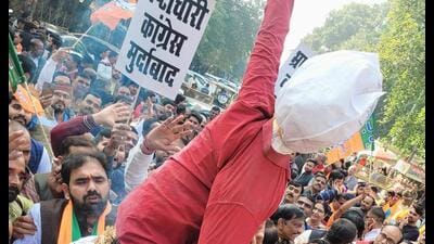 BJP workers burn an effigy of the Congress during a protest in Lucknow on December 9. (Sourced) BJP workers burn an effigy of the Congress during a protest in Lucknow on December 9. (Sourced)