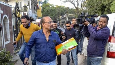 Income Tax officials come out from the residence of Jharkhand Congress MP Dheeraj Sahu in Ranchi Saturday. (PTI) Income Tax officials come out from the residence of Jharkhand Congress MP Dheeraj Sahu in Ranchi Saturday. (PTI)
