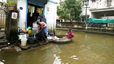 Chennai: Locals at Kamatchi Amman Nagar area inundated with floodwater after heavy rainfall in the aftermath of Cyclone Michaung, in Chennai, Friday, Dec. 8, 2023. (PTI) Chennai: Locals at Kamatchi Amman Nagar area inundated with floodwater after heavy rainfall in the aftermath of Cyclone Michaung, in Chennai, Friday, Dec. 8, 2023. (PTI)