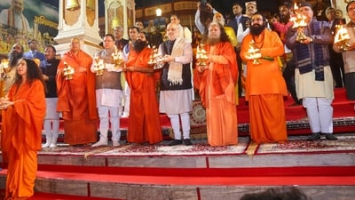 Union Home Minister Amit Shah with Swami Chidanand Saraswatiji, Uttarakhand Chief Minister Pushkar Singh Dhami and others participates in 'Ganga Aarti', at Parmarth Niketan Ashram in Rishikesh, Saturday, Dec. 9, 2023. (PTI) Union Home Minister Amit Shah with Swami Chidanand Saraswatiji, Uttarakhand Chief Minister Pushkar Singh Dhami and others participates in 'Ganga Aarti', at Parmarth Niketan Ashram in Rishikesh, Saturday, Dec. 9, 2023. (PTI)