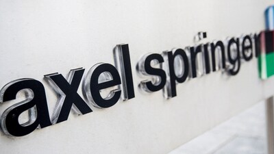The logo of German publisher Axel Springer is seen outside its headquarters in Berlin August 7, 2013. (REUTERS)