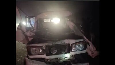The crushed Mahindra Bolera after the incident.