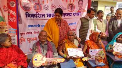 Union minister Smriti Irani with beneficiaries of government schemes during Viksit Bharat Yatra in Amethi on December 9. (Sourced) Union minister Smriti Irani with beneficiaries of government schemes during Viksit Bharat Yatra in Amethi on December 9. (Sourced)