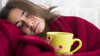 To conceal their true emotions from loved ones, individuals with high-functioning depression may grapple with persistent physical symptoms like headaches and stomach distress.&nbsp; (Shutterstock)