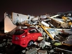 A car is buried under rubble on Main Street after a tornado hit Hendersonville, Tenn., Saturday, Dec. 9, 2023. A car is buried under rubble on Main Street after a tornado hit Hendersonville, Tenn., Saturday, Dec. 9, 2023.