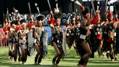 Visitors, including tourists from across the coutry and globe, participating in 'Unity Dance' around a large bonfire to the tune of Naga folk songs. (ANI) Visitors, including tourists from across the coutry and globe, participating in 'Unity Dance' around a large bonfire to the tune of Naga folk songs. (ANI)