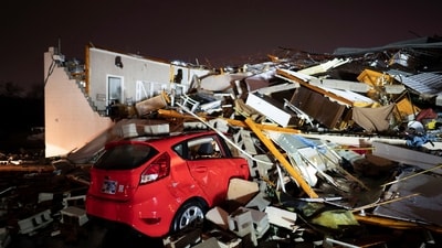 A car is buried under rubble on Main Street after a tornado hit Hendersonville, Tenn., Saturday, Dec. 9, 2023. (AP)