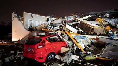 A car is buried under rubble on Main Street after a tornado hit Hendersonville, Tennessee. (AP) A car is buried under rubble on Main Street after a tornado hit Hendersonville, Tennessee. (AP)