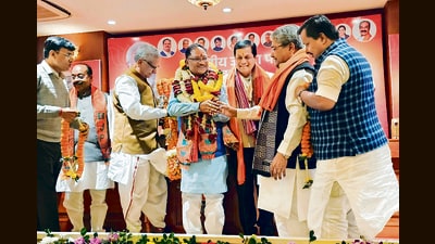 BJP leader Vishnu Deo Sai being garlanded by party leaders Sarbananda Sonowal and Dushyant Kumar Gautam in Raipur on Sunday. (PTI) BJP leader Vishnu Deo Sai being garlanded by party leaders Sarbananda Sonowal and Dushyant Kumar Gautam in Raipur on Sunday. (PTI)