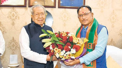 Chhattisgarh governor Biswabhusan Harichandanm(left) with chief minister-designate Vishnu Deo Sai in Raipur on Sunday. (PTI) Chhattisgarh governor Biswabhusan Harichandanm(left) with chief minister-designate Vishnu Deo Sai in Raipur on Sunday. (PTI)