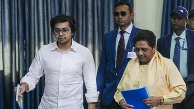 Mayawati arrives for the BSP meeting with her nephew Akash Anand at the party office in Lucknow on Sunday. (PTI) Mayawati arrives for the BSP meeting with her nephew Akash Anand at the party office in Lucknow on Sunday. (PTI)