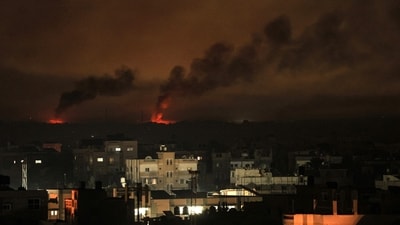 Israeli bombardment of Khan Yunis in the southern Gaza Strip as more civilians scramble for survival. (AFP) (AFP) Israeli bombardment of Khan Yunis in the southern Gaza Strip as more civilians scramble for survival. (AFP) (AFP)