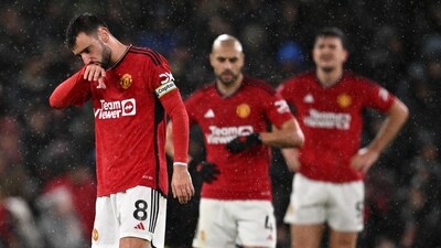 Manchester United's Portuguese midfielder #08 Bruno Fernandes (L) reacts after they concede their second goal during the English Premier League football match (AFP) Manchester United's Portuguese midfielder #08 Bruno Fernandes (L) reacts after they concede their second goal during the English Premier League football match (AFP)