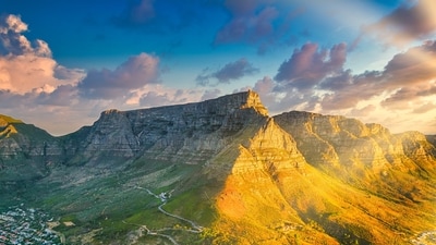 Table Mountain, South Africa: Table Mountain is one of the world's most renowned peaks, recognized for its distinctive flat top and diverse wildlife. It is also among the planet’s oldest peaks, with an age exceeding 200 million years. The first recorded ascent dates back to the early 16th century, credited to a Portuguese explorer named António de Saldanha. (Unsplash) Table Mountain, South Africa: Table Mountain is one of the world's most renowned peaks, recognized for its distinctive flat top and diverse wildlife. It is also among the planet’s oldest peaks, with an age exceeding 200 million years. The first recorded ascent dates back to the early 16th century, credited to a Portuguese explorer named António de Saldanha. (Unsplash)