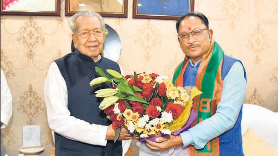 Chhattisgarh governor Biswabhusan Harichandanm(left) with chief minister-designate Vishnu Deo Sai in Raipur on Sunday. (PTI)