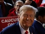 FILE PHOTO: Former U.S. President and Republican presidential candidate Donald Trump rallies with supporters at a "commit to caucus" event at a Whiskey bar in Ankeny, Iowa, U.S. December 2, 2023. REUTERS/Carlos Barria/File Photo