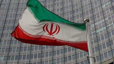 Israel-Hamas War: An Iranian flag flutters in front of the International Atomic Energy Agency (IAEA) headquarters. (Reuters)