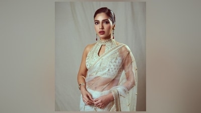 Meanwhile, Bhumi chose darkened brows, shimmering smoky eye shadow, mascara on the lashes, rouge on the cheekbones, beaming highlighter, glossy berry-toned lip shade, and subtle contouring for the glam picks. A side-parted sleek bun gave the finishing touch. (Instagram) Meanwhile, Bhumi chose darkened brows, shimmering smoky eye shadow, mascara on the lashes, rouge on the cheekbones, beaming highlighter, glossy berry-toned lip shade, and subtle contouring for the glam picks. A side-parted sleek bun gave the finishing touch. (Instagram)