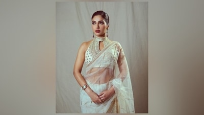 Bhumi accessorised the ethnic look with minimal additions, including gold polki jhumkis, statement rings, and a broad bracelet adorned with gemstones. Lastly, matching footwear featuring high heels rounded it off. (Instagram) Bhumi accessorised the ethnic look with minimal additions, including gold polki jhumkis, statement rings, and a broad bracelet adorned with gemstones. Lastly, matching footwear featuring high heels rounded it off. (Instagram)