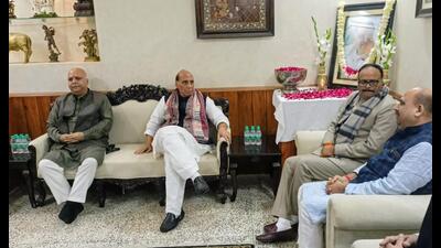 Defence minister Rajnath Singh paid tribute to former party lawmaker Ashutosh Tandon at the latter’s residence in Lucknow on December 11 . (Sourced)