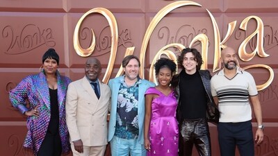 Actors Natasha Rothwell, Paterson Joseph, Calah Lane, Timothee Chalamet and Keegan-Michael Key pose with director Paul King as they attend a premiere for their film Wonka in Los Angeles. In the musical origin story of Willy Wonka, Timothee stars in the titular role of a magical chocolate-maker who has run-ins with an orange-and-green Oompa Loompa, played by Hugh. (REUTERS)