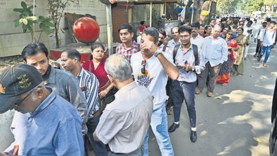 Mumbai, India - Dec. 11, 2023: People standing in an queue outside MAHADA office, Bandra, in Mumbai, India, on Monday, December 11, 2023. (Photo by Anshuman Poyrekar/ Hindustan Times) (Hindustan Times)