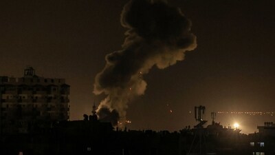 Smoke billowing near the Egyptian border, in the southern Gaza Strip, during an Israeli strike. (AFP) Smoke billowing near the Egyptian border, in the southern Gaza Strip, during an Israeli strike. (AFP)