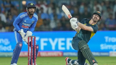 Australian batter Travis Head plays a shot during the 5th T20I cricket match between India and Australia, at M. Chinnaswamy Stadium, in Bengaluru (PTI) Australian batter Travis Head plays a shot during the 5th T20I cricket match between India and Australia, at M. Chinnaswamy Stadium, in Bengaluru (PTI)
