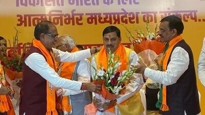 Mohan Yadav is congratulated by outgoing chief minister Shivraj Singh Chouhan at the BJP headquarters in Bhopal. (X/ANI) Mohan Yadav is congratulated by outgoing chief minister Shivraj Singh Chouhan at the BJP headquarters in Bhopal. (X/ANI)