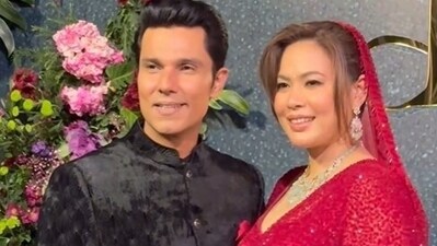 Randeep Hooda and Lin Laishram at their wedding reception in Mumbai Randeep Hooda and Lin Laishram at their wedding reception in Mumbai