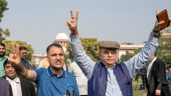 Kashmiri Hindus react after the Supreme Court upheld the Centre's decision to abrogate Article 370 of the Constitution, outside the court in New Delhi, Monday, Dec. 11, 2023. Kashmiri Hindus react after the Supreme Court upheld the Centre's decision to abrogate Article 370 of the Constitution, outside the court in New Delhi, Monday, Dec. 11, 2023.