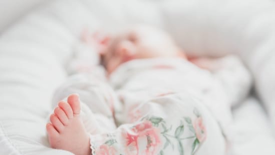 Dress your baby in layers: Begin with a bodysuit and leggings as the first layer, followed by pants and a long-sleeve shirt. Finish off with a jacket, cap, mittens, and warm booties as the outermost layer. Prioritize breathable fabrics like cotton and muslin during the layering process.&nbsp;(Unsplash)