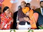 Bharatiya Janata Party (BJP) MLA Bhajan Lal Sharma exchanges greetings with party National Vice President Vasundhara Raje.
Bharatiya Janata Party (BJP) MLA Bhajan Lal Sharma exchanges greetings with party National Vice President Vasundhara Raje.