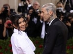 FILE PHOTO: Travis Barker and Kourtney Kardashian arrive at the In America: An Anthology of Fashion themed Met Gala at the Metropolitan Museum of Art in New York City, New York, U.S., May 2, 2022. REUTERS/Andrew Kelly/File Photo