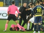 MKE Ankaragucu President Faruk Koca reacts as the referee Halil Umut Meler lies on the ground at the end of their Super Lig home match.