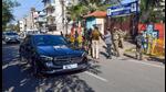 Jharkhand CM Hemant Soren (in the car) passes by the ED office in Ranchi on Tuesday, the day he was summoned by the agency to appear before it for questioning. (ANI)