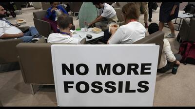 A sign at the COP28. (AP) A sign at the COP28. (AP)