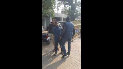 Arrested accused with police. (HT Photo)