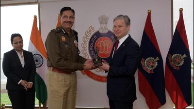 FBI director Christopher A Wray meets commissioner Sanjay Arora at the Delhi Police headquarters on Tuesday.