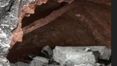 Road caves in near Bengaluru's Kensington signal, huge sink hole formed Road caves in near Bengaluru's Kensington signal, huge sink hole formed
