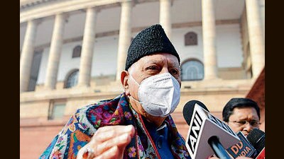 National Conference MP Farooq Abdullah speaks to the media outside the Parliament in New Delhi on Tuesday. (ANI)
