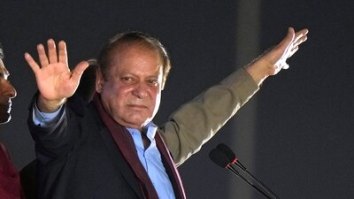 Pakistan's former prime minister Nawaz Sharif waves to his supporters. (AP) Pakistan's former prime minister Nawaz Sharif waves to his supporters. (AP)