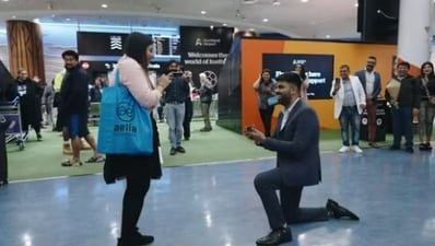 Man proposes to woman at Auckland Airport. Man proposes to woman at Auckland Airport.