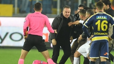 MKE Ankaragucu President Faruk Koca reacts as the referee Halil Umut Meler lies on the ground at the end of their Super Lig home match. (Reuters)