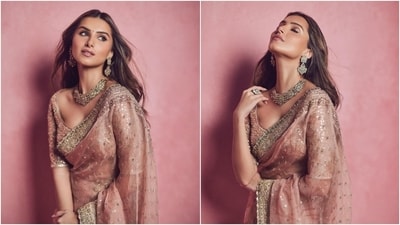 Wedding season is upon us, and finding the correct outfit becomes a priority. Indian weddings have tons of functions. So, if you are a bride-to-be, you need a perfect ensemble for every occasion. In case you are searching for sartorial ideas to revamp your trousseau, we have an engagement look from Tara Sutaria's wardrobe that will be a hit this shaadi season. Scroll through to check it out. (Instagram) Wedding season is upon us, and finding the correct outfit becomes a priority. Indian weddings have tons of functions. So, if you are a bride-to-be, you need a perfect ensemble for every occasion. In case you are searching for sartorial ideas to revamp your trousseau, we have an engagement look from Tara Sutaria's wardrobe that will be a hit this shaadi season. Scroll through to check it out. (Instagram)