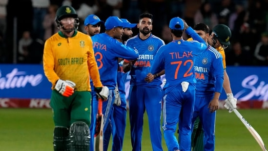 India's bowler Mohammed Siraj, centre, celebrates with teammates after dismissing South Africa's batsman Heinrich Klaasen for 7 runs (AP)